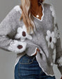 THEA | ELEGANTE TRUI MET V-HALS EN BLOEMENPRINT
