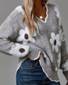 THEA | ELEGANTE TRUI MET V-HALS EN BLOEMENPRINT