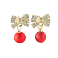 Kerstoorbel met strik in rood en goud