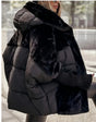 Oversized pufferjack met capuchon van imitatiebont – ultrawarme streetstyle