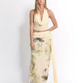 Midnight Muse haltertop en rok met hoge split