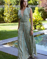 Isla Luxe – Jumpsuit met print, open rug en wijde pijpen
